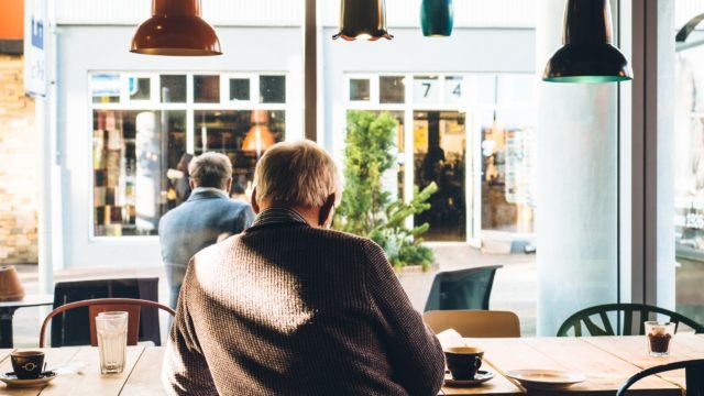 Retired Man in Coffee Shop