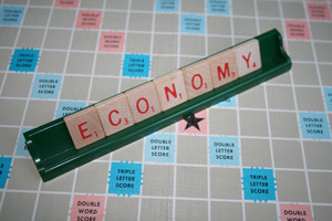 Economy spelt with Scrabble letters