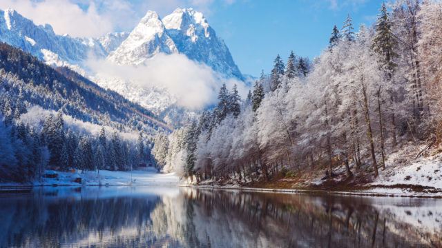Winter landscape with lake and reflection