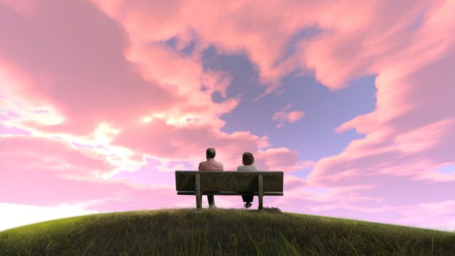 A couple sit on a bench pondering an uncertain future