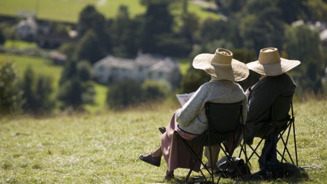 Two elderly people relaxing