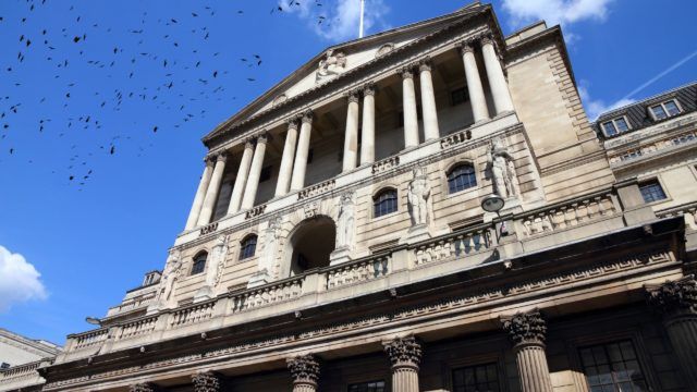 London, United Kingdom - Bank of England building with ominous crows.