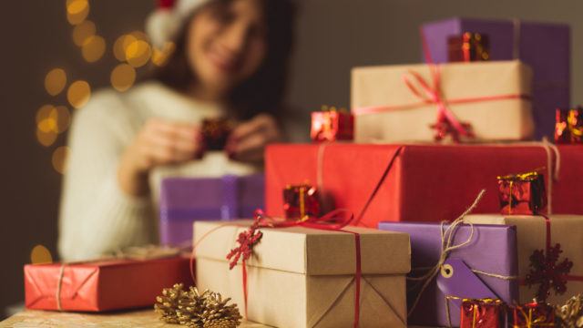 Girl opening Christmas presents