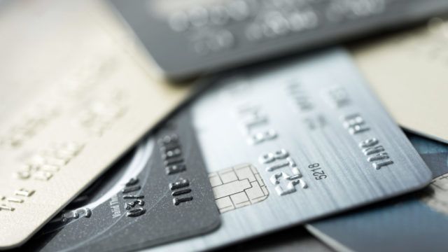Close up of credit cards forming background