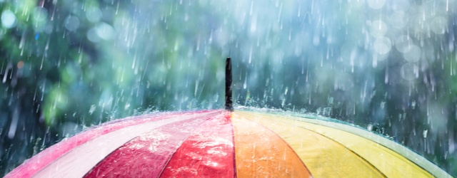 Rain hitting umbrella