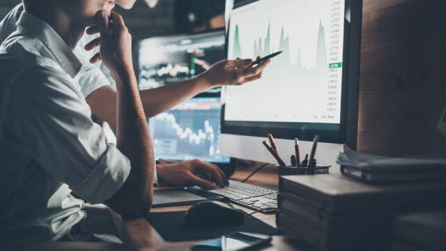 two people looking at index graph