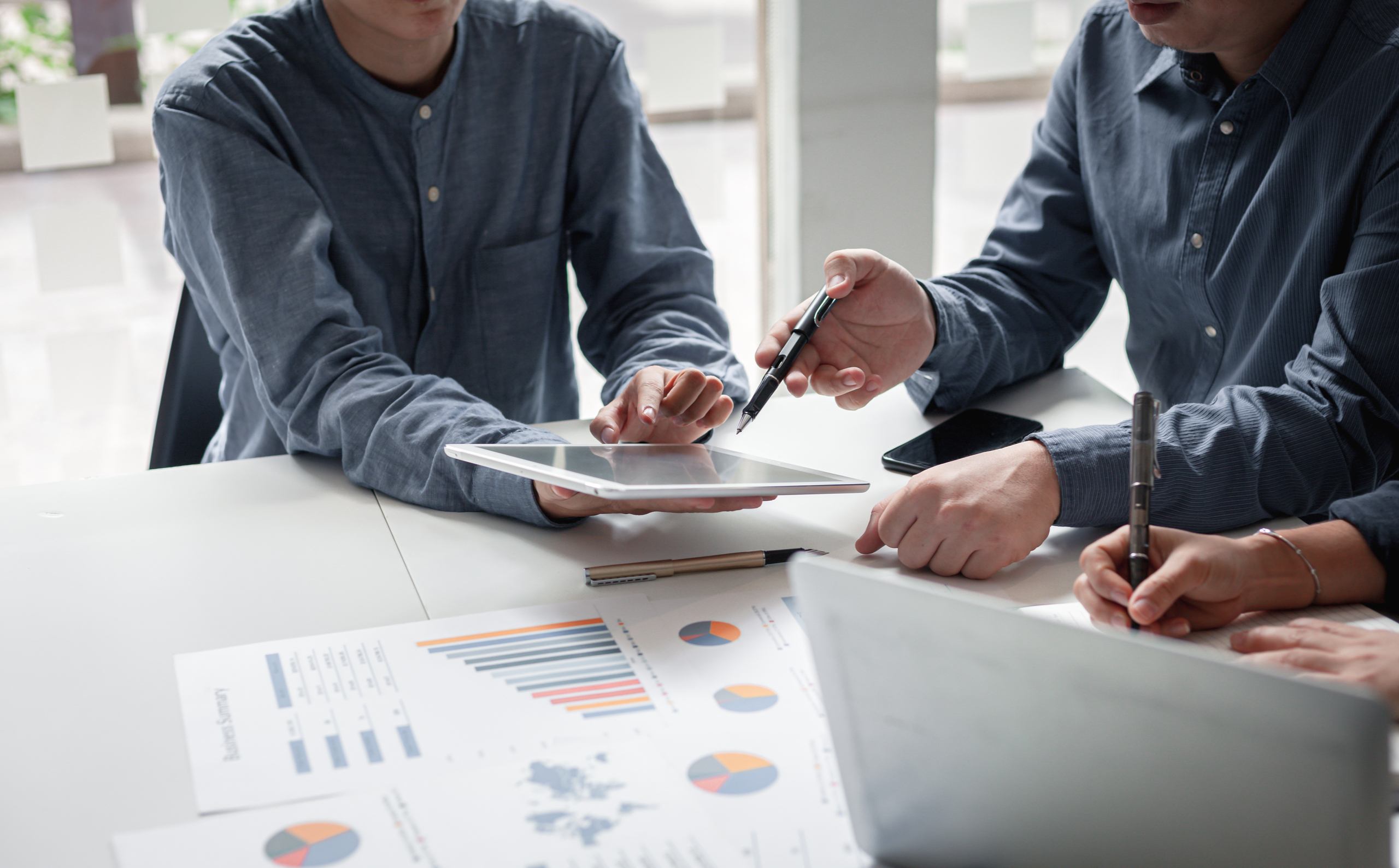 financial planners discussing a portfolio