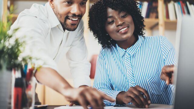 Couple looking at computer